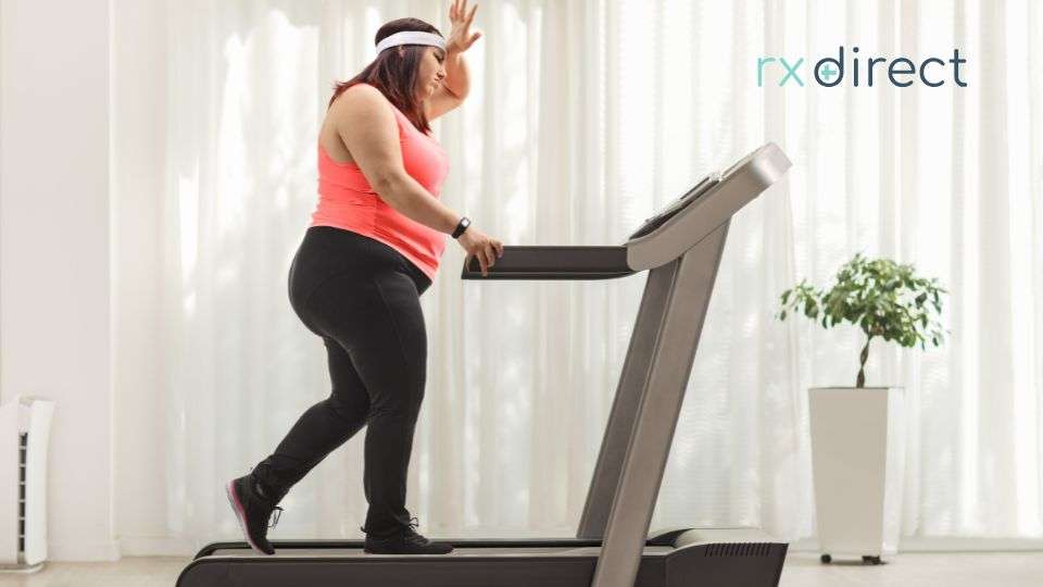 Overweight woman on a treadmill