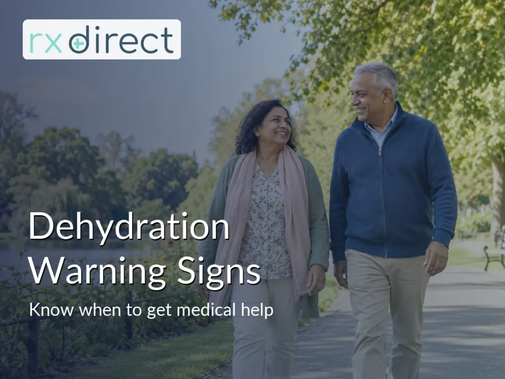 Older couple walking along a level park path, with the RX Direct logo